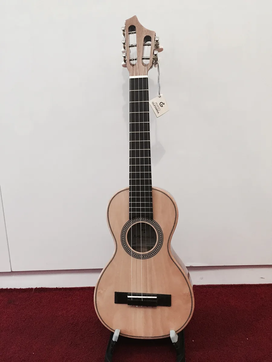 A rajao, a small five-string guitar-like instrument of the type played in Madeira, with a pale body and dark neck